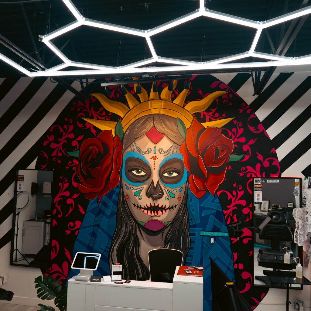 Day of the Dead mural above the reception desk at Uppercuts Tattoo Shop, Maple Ridge